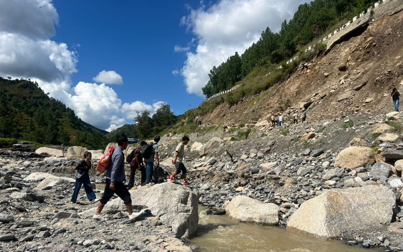 Roshi River Flood and Landslide Severely Damage BP Highway; Travelers Forced to Walk for Hours